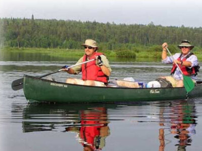 Paddling Canoe On Lake